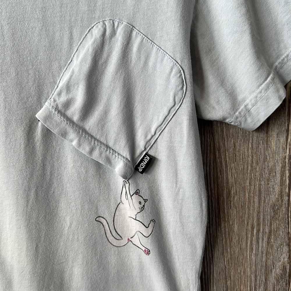 Ripndip men’s baby blue tee with upside down pocket, small